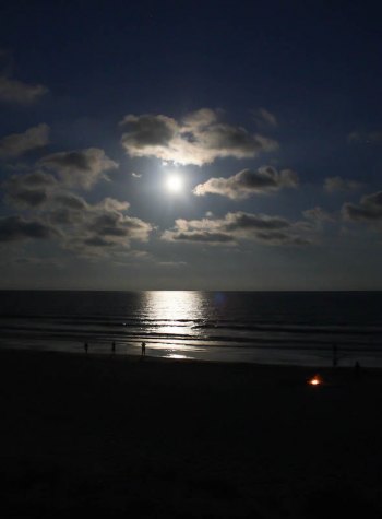 Full moon with beach fire